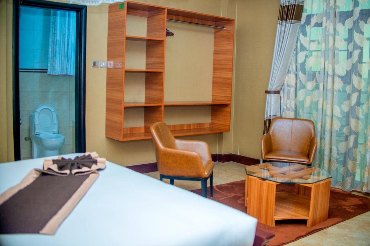 Hera Hotel Кампала Экстерьер фото